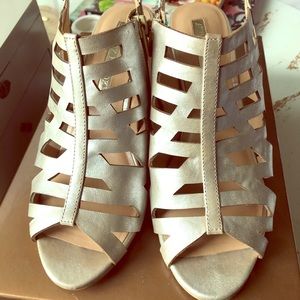 Audrey Brooke gold heels.